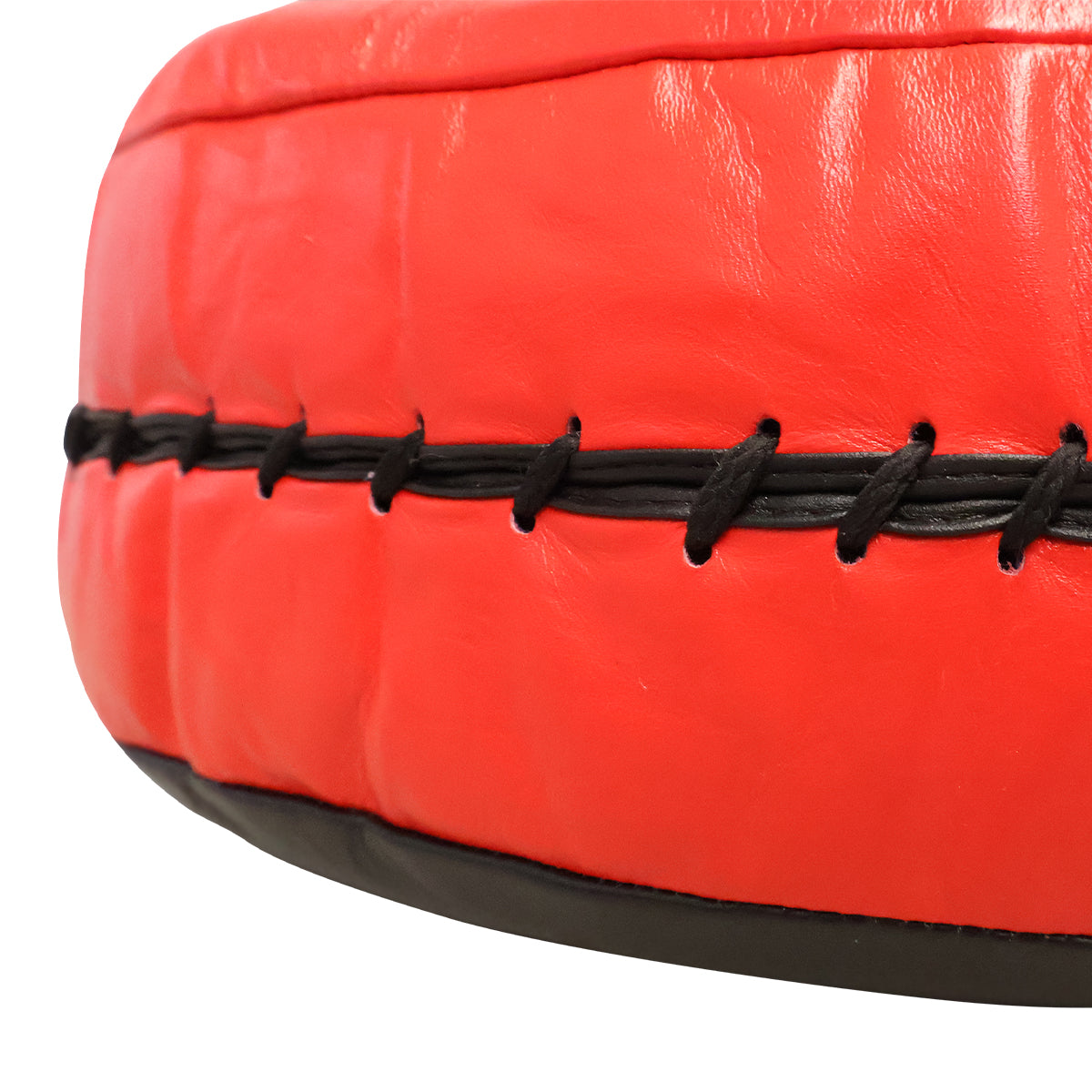 Grande poire de boxe ronde en cuir